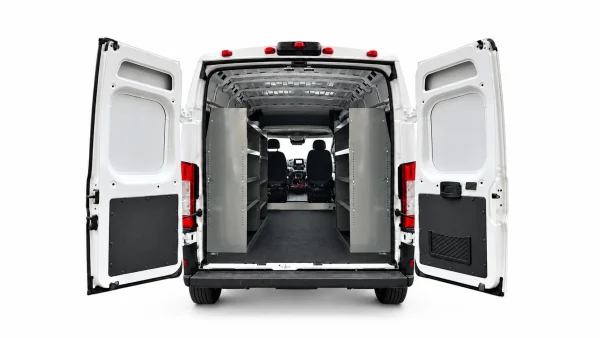 RAM ProMaster steel shelving package VA6016-3P with three units installed along both cargo walls, viewed through the rear doors