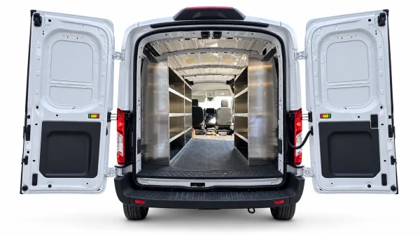 Ford Transit aluminum shelving set of 3 installed with two driver-side units and one passenger-side unit, viewed through the open rear doors