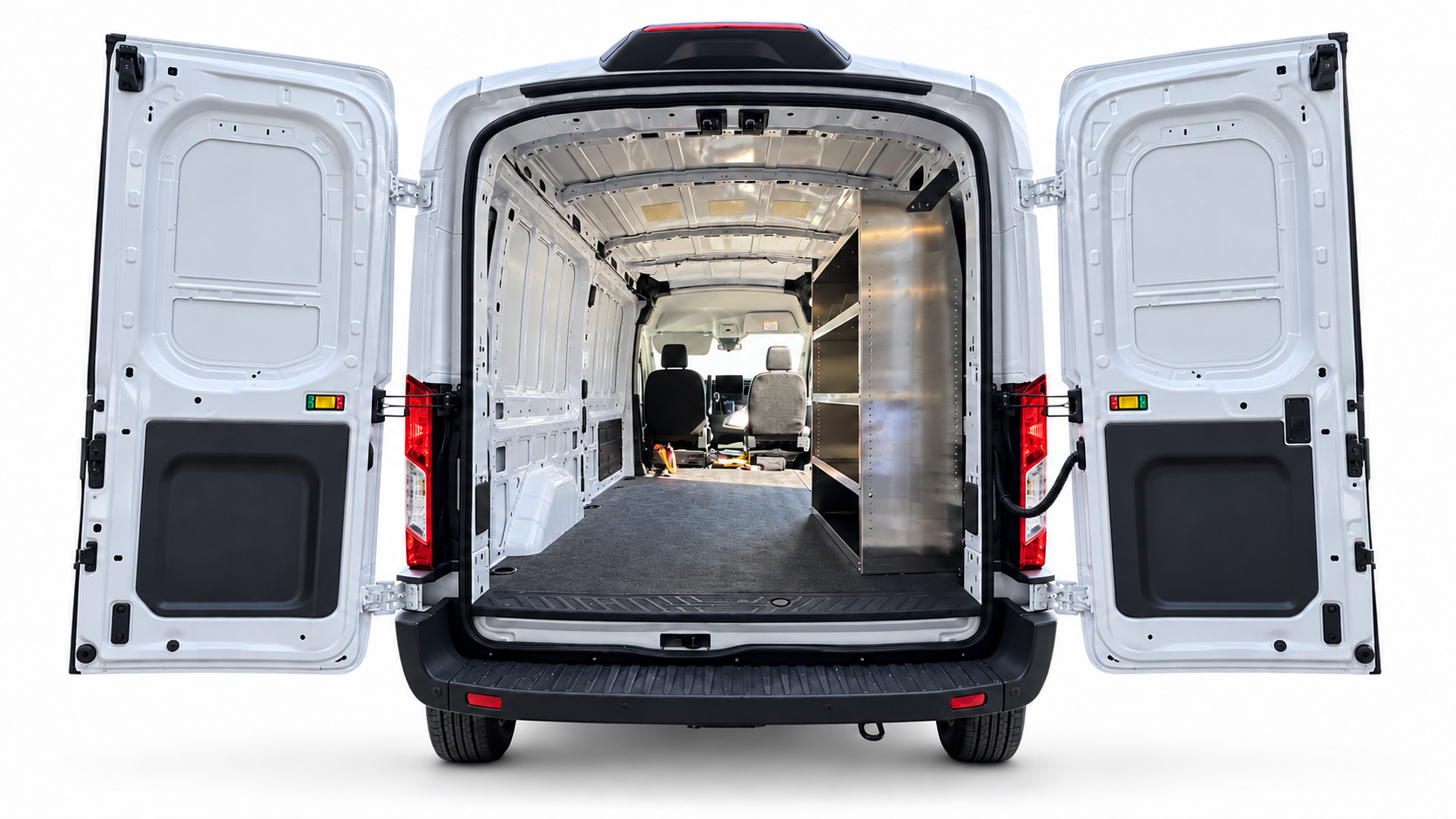 Ford Transit aluminum shelving unit installed on the passenger side, viewed through the open rear doors.