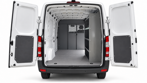 Mercedes-Benz Sprinter steel shelving unit installed on the passenger side, viewed through the open rear doors.